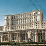 Capture of the iconic Palace of the Parliament in Bucharest, Romania under clear skies.